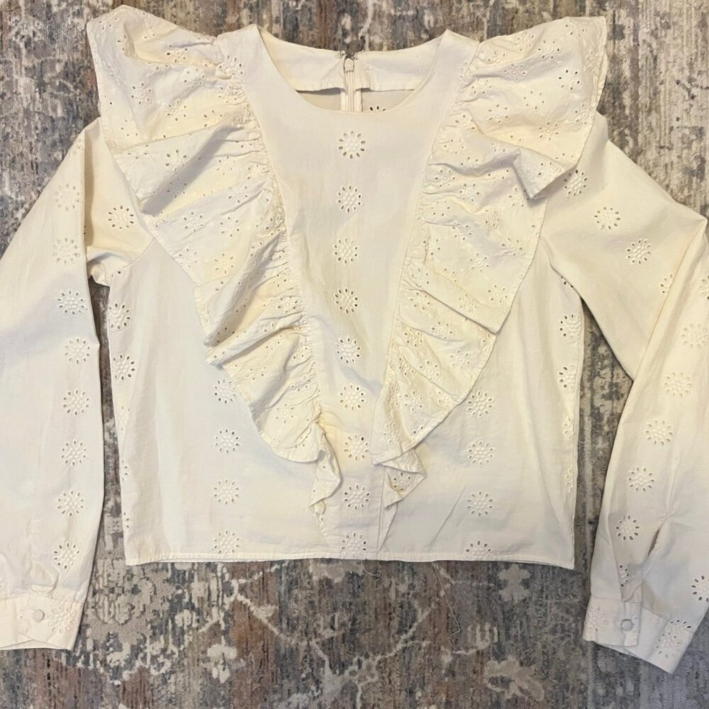 White eyelet ruffle blouse